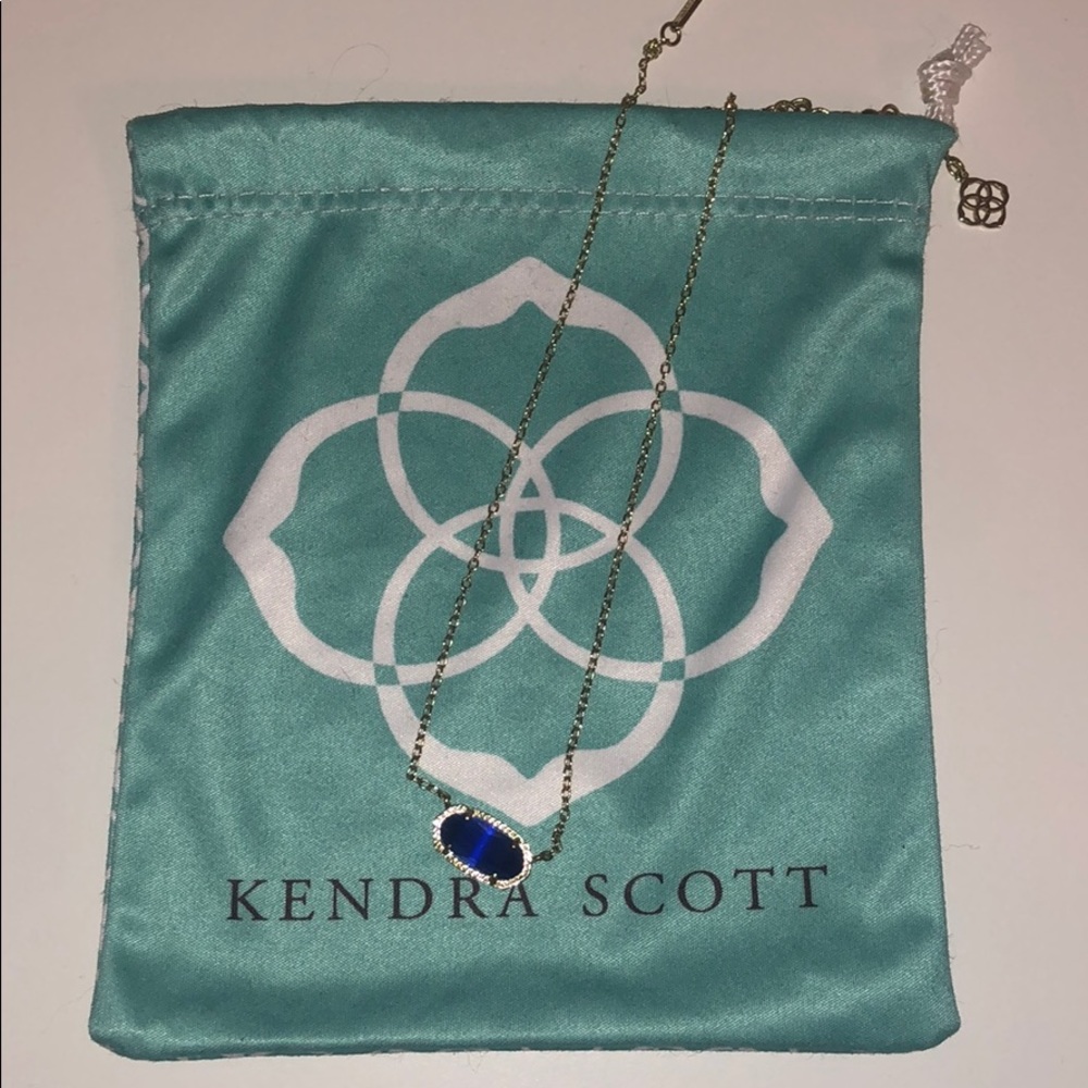 royal blue kendra scott with gold chain